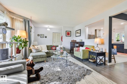 Open-concept living space with wood-finish flooring - 8932 187 Street Nw, Edmonton, AB - Indoor Photo Showing Living Room