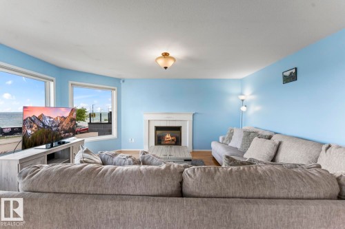 1805 1 Avenue, Cold Lake, AB - Indoor Photo Showing Living Room With Fireplace