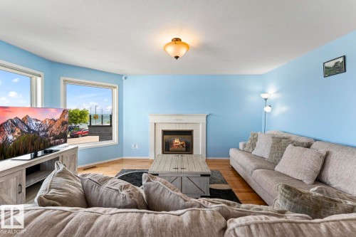 1805 1 Avenue, Cold Lake, AB - Indoor Photo Showing Living Room With Fireplace