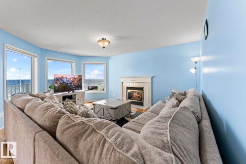 1805 1 Avenue, Cold Lake, AB - Indoor Photo Showing Living Room With Fireplace