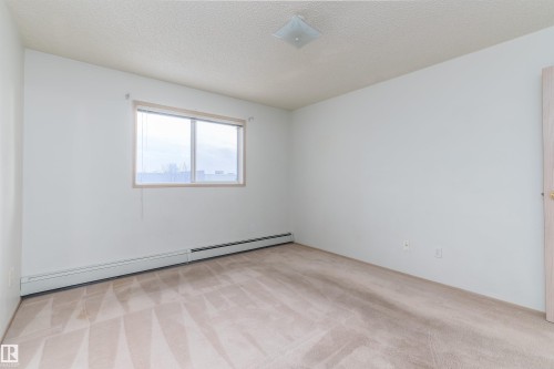 #306 4220 139 Av Nw, Edmonton, AB - Indoor Photo Showing Other Room