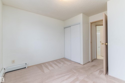 #306 4220 139 Av Nw, Edmonton, AB - Indoor Photo Showing Other Room