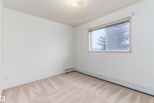 #306 4220 139 Av Nw, Edmonton, AB - Indoor Photo Showing Other Room