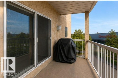 Private balcony with durable railings and textured flooring - #306 4220 139 Av Nw, Edmonton, AB - Outdoor With Exterior