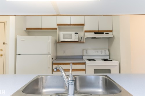 #306 4220 139 Av Nw, Edmonton, AB - Indoor Photo Showing Kitchen With Double Sink