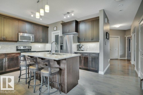 155 Kirpatrick Crescent, Leduc, AB - Indoor Photo Showing Kitchen With Upgraded Kitchen