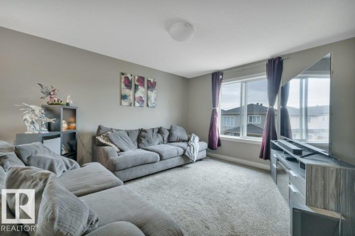 155 Kirpatrick Crescent, Leduc, AB - Indoor Photo Showing Living Room