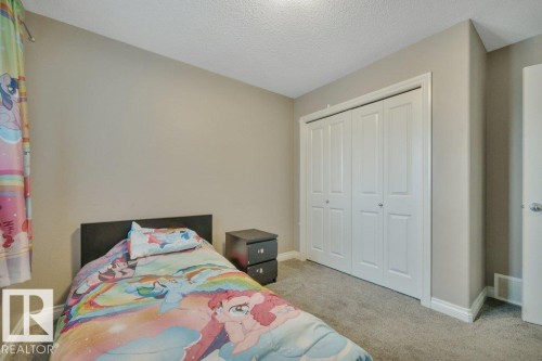 155 Kirpatrick Crescent, Leduc, AB - Indoor Photo Showing Bedroom