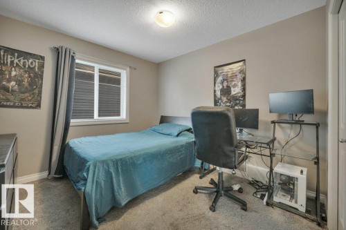 155 Kirpatrick Crescent, Leduc, AB - Indoor Photo Showing Bedroom