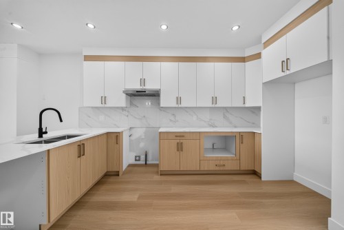 508 Robinson Boulevard, Leduc, AB - Indoor Photo Showing Kitchen With Double Sink