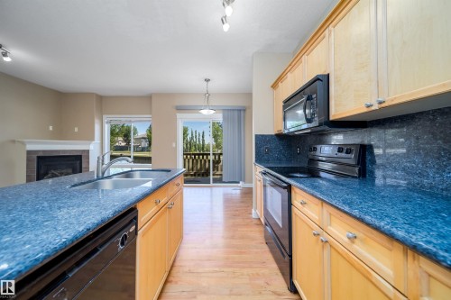 #46 15151 43 St Nw, Edmonton, AB - Indoor Photo Showing Kitchen With Double Sink