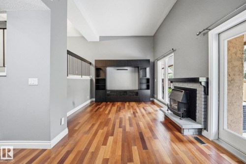 48 Glaewyn Estates, St. Albert, AB - Indoor Photo Showing Other Room With Fireplace