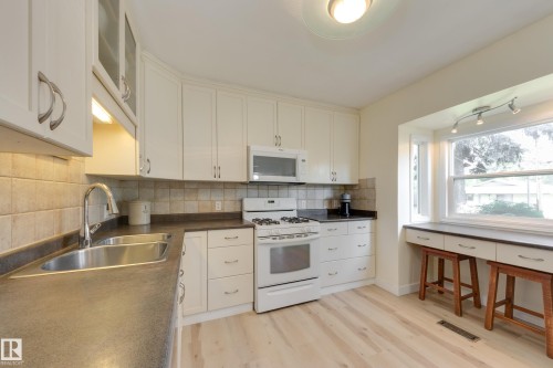 10644 65 Avenue Nw, Edmonton, AB - Indoor Photo Showing Kitchen With Double Sink