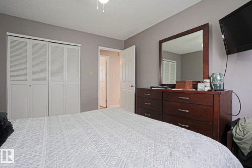 Bedroom with neutral gray wall paint - 5203 45 Street, Beaumont, AB - Indoor Photo Showing Bedroom