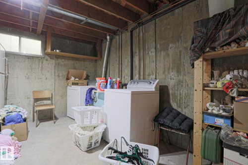 Image quality insufficient for description - 5203 45 Street, Beaumont, AB - Indoor Photo Showing Laundry Room