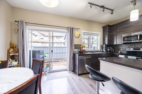 #4 3710 Allan Dr Sw, Edmonton, AB - Indoor Photo Showing Kitchen With Double Sink