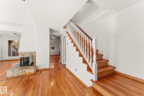 5367 Hill View Crescent Nw, Edmonton, AB - Indoor Photo Showing Other Room With Fireplace