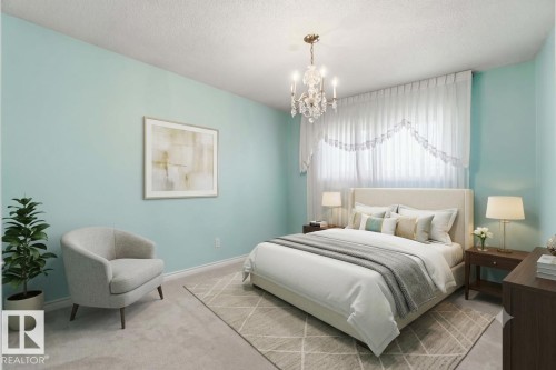 Chandelier lighting, window with sheer white curtains, wall-to-wall carpeting, light blue wall paint, and white trim - 8031 135A Avenue Nw, Edmonton, AB - Indoor Photo Showing Bedroom