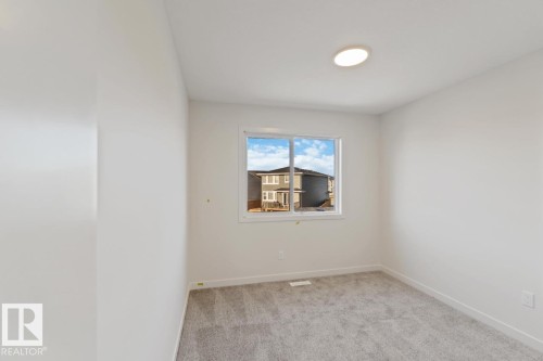 7128 50A Avenue, Beaumont, AB - Indoor Photo Showing Other Room
