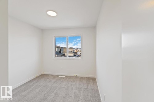 7128 50A Avenue, Beaumont, AB - Indoor Photo Showing Other Room