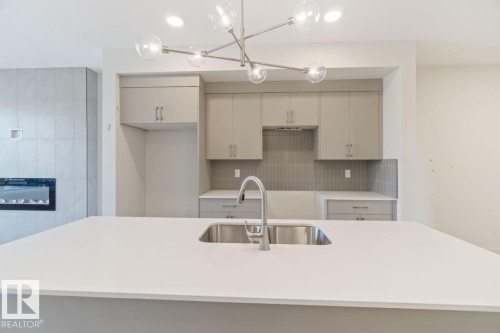 7128 50A Avenue, Beaumont, AB - Indoor Photo Showing Kitchen With Double Sink