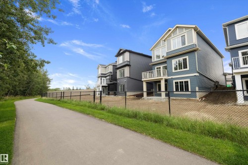 Newly constructed multi-story residence featuring blue siding and white trim - 971 Elderberry Landing Nw, Edmonton, AB - Outdoor