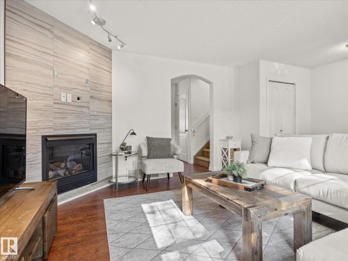 1502 Grant Way Nw, Edmonton, AB - Indoor Photo Showing Living Room With Fireplace