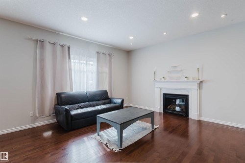 5623 206 Street Nw, Edmonton, AB - Indoor Photo Showing Living Room With Fireplace
