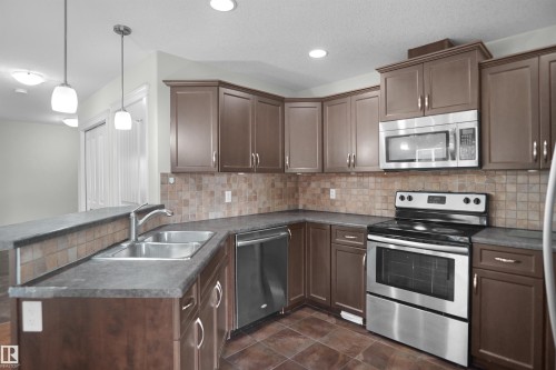 1708 65 Street Sw, Edmonton, AB - Indoor Photo Showing Kitchen With Double Sink