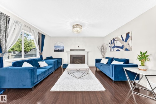 8314 180A Avenue Nw, Edmonton, AB - Indoor Photo Showing Living Room With Fireplace
