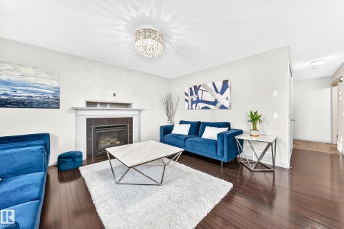 8314 180A Avenue Nw, Edmonton, AB - Indoor Photo Showing Living Room With Fireplace