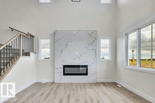 409 Robinson Boulevard, Leduc, AB - Indoor With Fireplace
