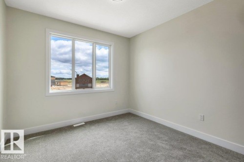 409 Robinson Boulevard, Leduc, AB - Indoor Photo Showing Other Room
