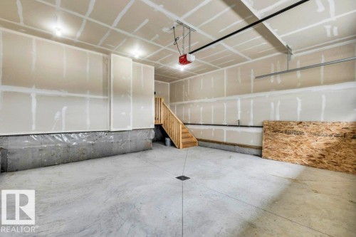 409 Robinson Boulevard, Leduc, AB - Indoor Photo Showing Garage