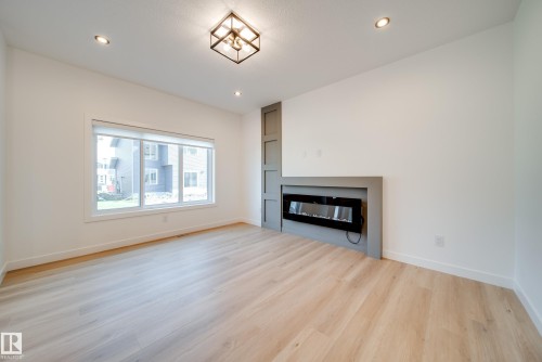 10 Blackbird Bend, Fort Saskatchewan, AB - Indoor Photo Showing Living Room With Fireplace