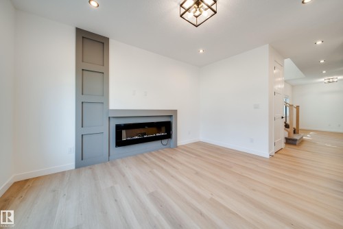 10 Blackbird Bend, Fort Saskatchewan, AB - Indoor Photo Showing Living Room With Fireplace
