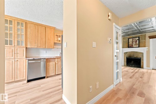 #41 4707 126 Av Nw, Edmonton, AB - Indoor With Fireplace
