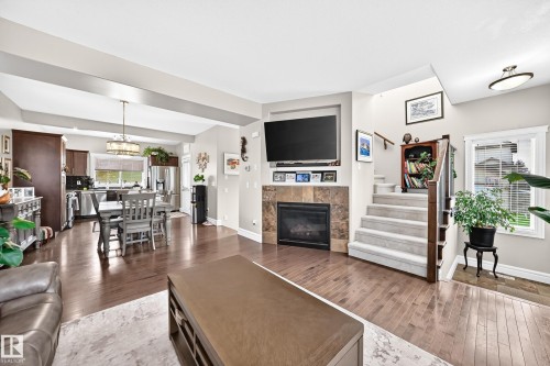 301 Sheridan Way, Leduc, AB - Indoor Photo Showing Living Room With Fireplace