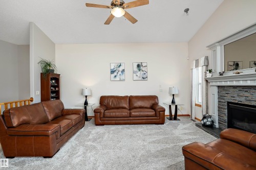 1 Linksview Cl, Spruce Grove, AB - Indoor Photo Showing Living Room With Fireplace