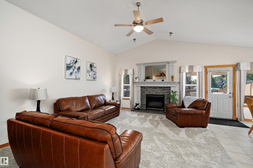 1 Linksview Cl, Spruce Grove, AB - Indoor Photo Showing Living Room With Fireplace