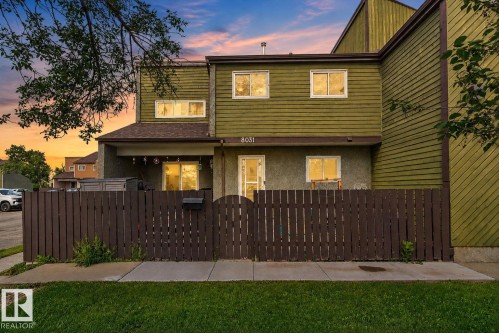 Multi-level facade with horizontal and diagonal siding, featuring a covered entry - 8031 27 Avenue Nw, Edmonton, AB - Outdoor