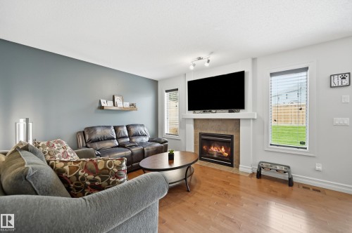 49 Navajo Ln, Fort Saskatchewan, AB - Indoor Photo Showing Living Room With Fireplace