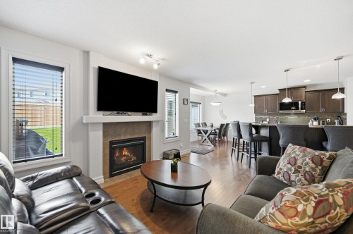 49 Navajo Ln, Fort Saskatchewan, AB - Indoor Photo Showing Living Room With Fireplace
