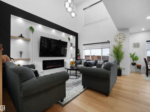 2928 1 Avenue Sw, Edmonton, AB - Indoor Photo Showing Living Room With Fireplace