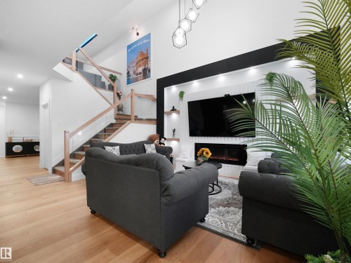 2928 1 Avenue Sw, Edmonton, AB - Indoor Photo Showing Other Room With Fireplace