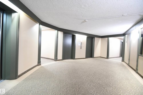 With multiple elevators, and large & open common areas, this is a very inviting building - #1305 13910 Stony Plain Rd Nw, Edmonton, AB - Indoor Photo Showing Other Room