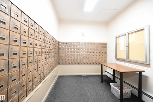 Care, attention, and pride of ownership even shows in the mail room - #1305 13910 Stony Plain Rd Nw, Edmonton, AB - Indoor Photo Showing Other Room