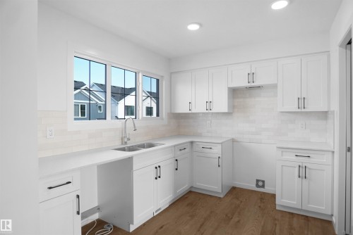 #48 1009 Cy Becker Rd Nw, Edmonton, AB - Indoor Photo Showing Kitchen With Double Sink