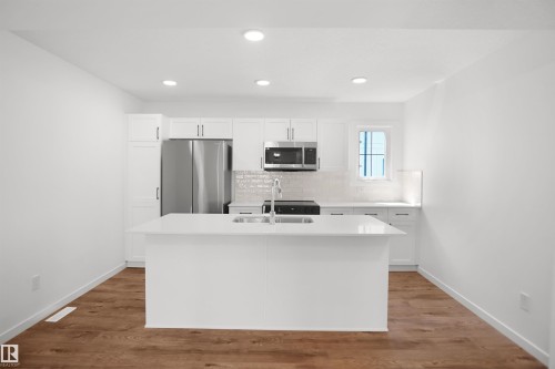 7060 Rosenthal Drive Nw, Edmonton, AB - Indoor Photo Showing Kitchen With Double Sink With Upgraded Kitchen