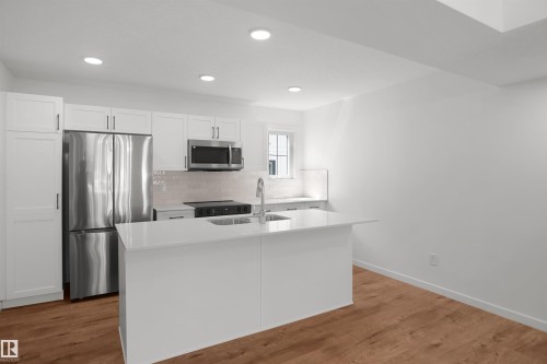 7060 Rosenthal Drive Nw, Edmonton, AB - Indoor Photo Showing Kitchen With Double Sink With Upgraded Kitchen